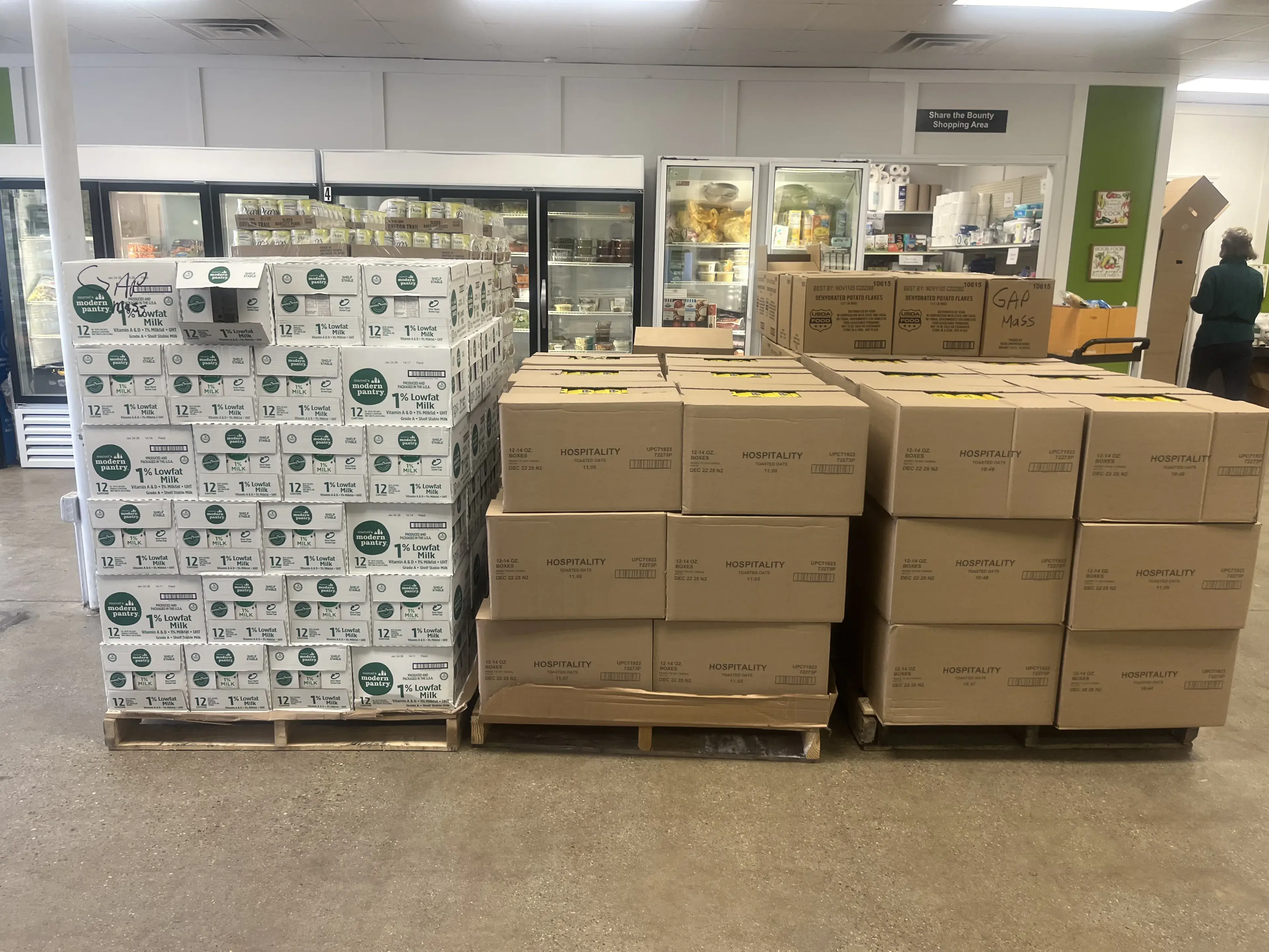 Volunteers working together at The Green Apple Pantry